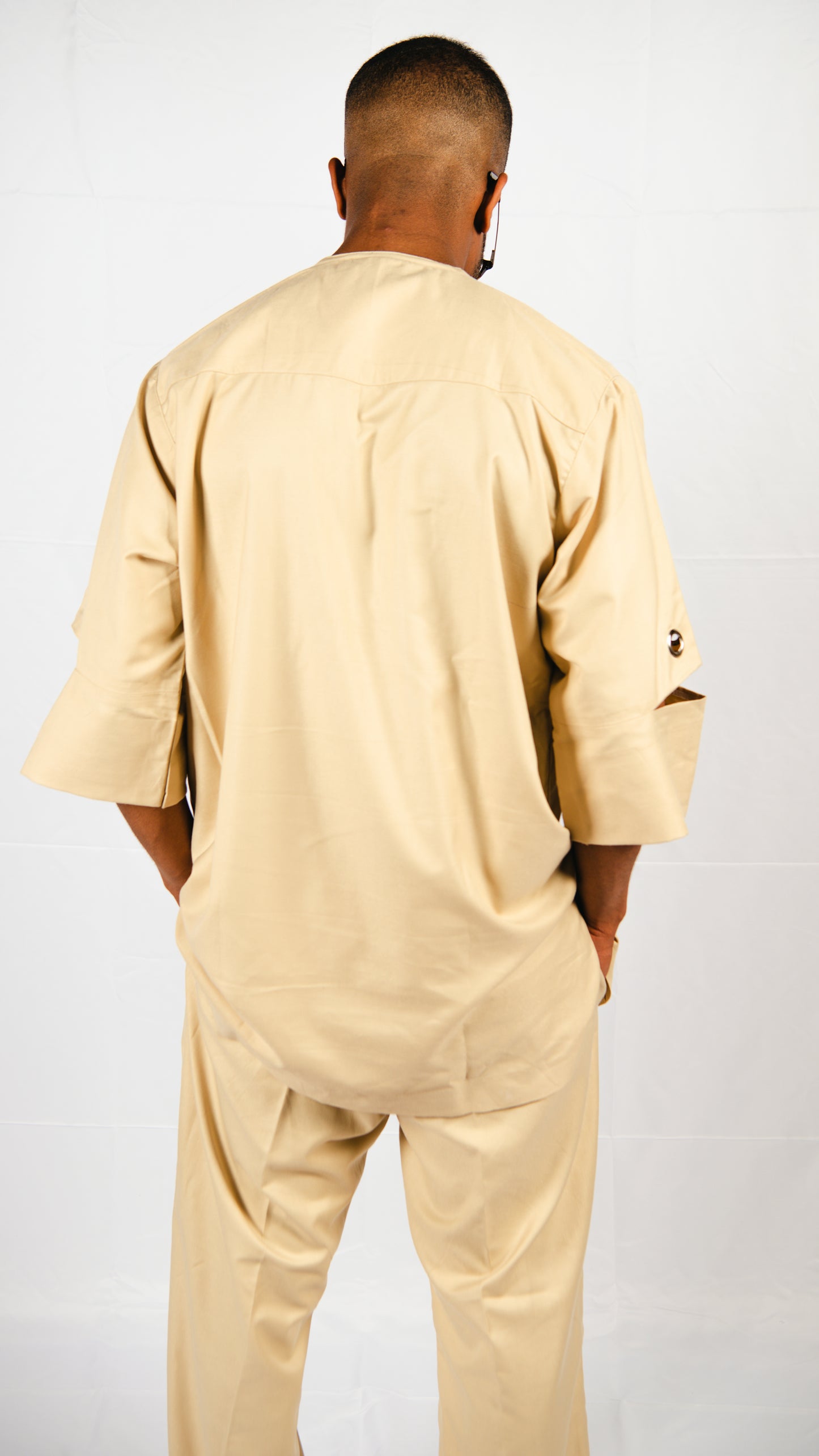 Manuél Beige 2 piece Trousers and Layered Top With Cut-out Sleeves