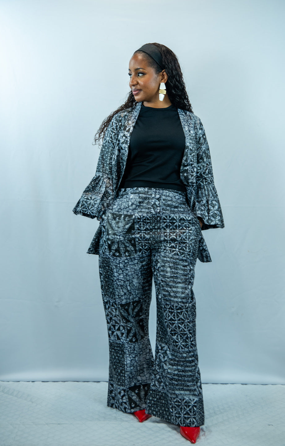Zendaya Black and White Print 2 Piece Wide Leg Trousers and Pleated Blouse