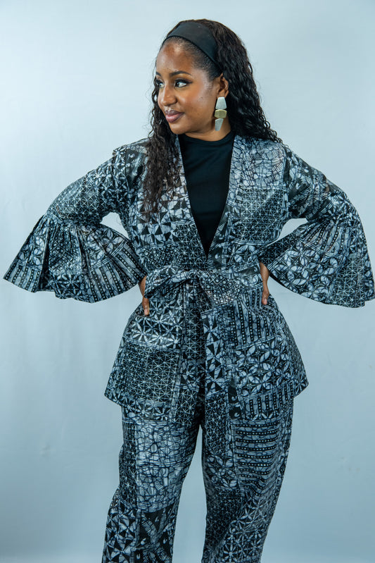 Zendaya Black and White Print 2 Piece Wide Leg Trousers and Pleated Blouse